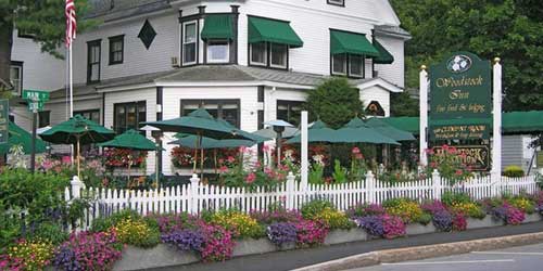 Exterior with Flowers - Woodstock Inn, Station & Brewery - North Woodstock, NH