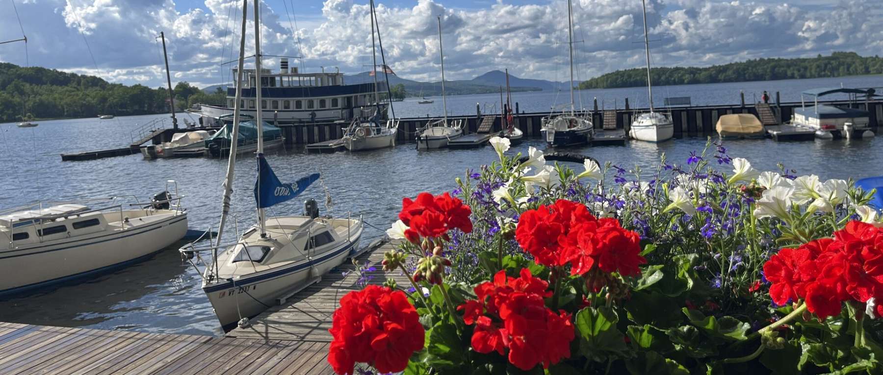 Boats & Flowers on Lake Champlain Vermont - Photo Credit Northern Forest Center