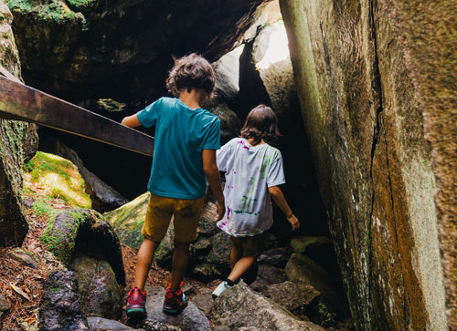 Kids Descending into Polar Caves - Rumney, NH